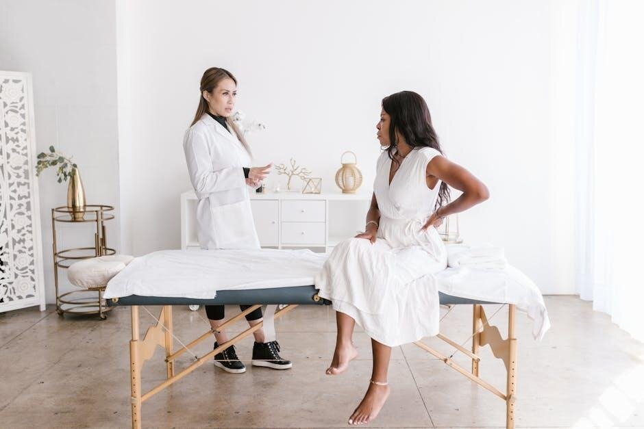 A pain management specialist reviewing imaging during a consultation